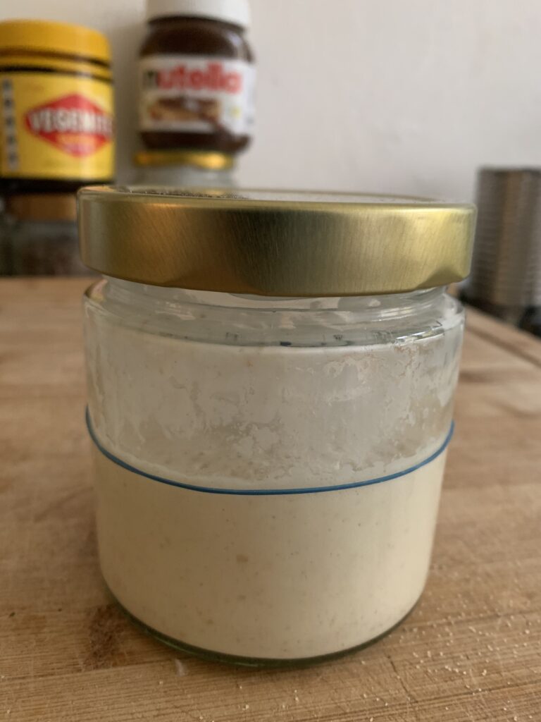 Day 10 sourdough starter, collapsed to original volume